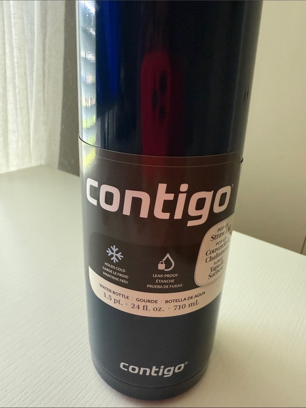 New Contigo proof bottle of water with lid lock and angled straw 24oz blueberry